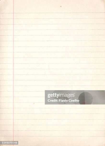 old yellowish lined paper college ruled background - lijntjespapier stockfoto's en -beelden