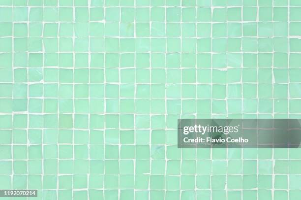 transparent glass tiles wall background - tiled wall stock-fotos und bilder