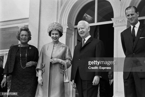 Queen Elizabeth II of the United Kingdom stands next to President Heinrich Lubke of West Germany, his wife Wilhelmine Lubke and Prince Philip outside...