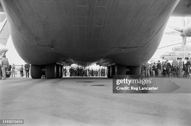 View of the landing gear and undercarriage of the prototype Soviet built Antonov An-22 military transport aircraft parked on the apron during the...