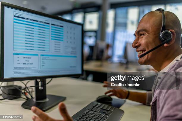 customer service representative working in call centre - hairless mouse stock pictures, royalty-free photos & images