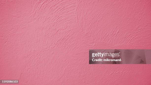 abstract background texture concrete or plaster hand made wall - rosa colore foto e immagini stock