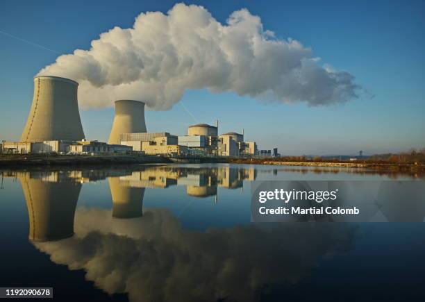 magic reflection of a nuclear power plant/clean energy - french nuclear stock pictures, royalty-free photos & images