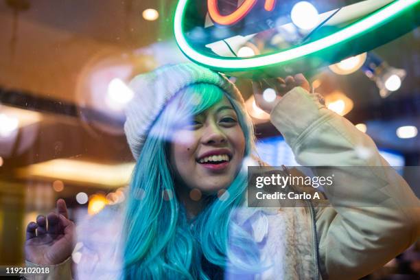 portrait of young asian woman wearing a wig at night. - korean people 個照片及圖片檔