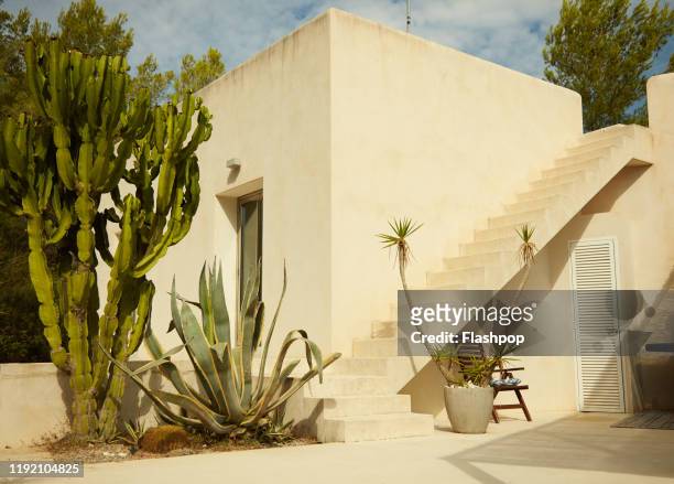 outside a luxury spanish villa - stone patio stock pictures, royalty-free photos & images