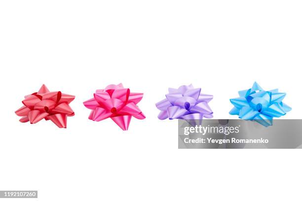 gift bows in assorted colours, isolated on white background - bow stockfoto's en -beelden