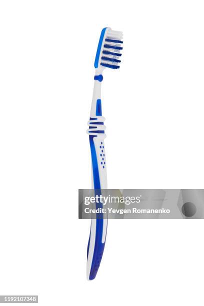 toothbrush isolated on a white background - toothbrush photos et images de collection