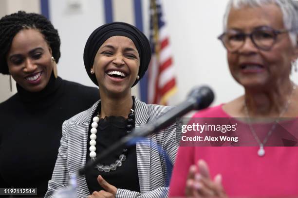 Rep. Bonnie Coleman Watson speaks as Rep. Ayanna Pressley and Rep. Ilhan Omar listen during a news conference December 5, 2019 on Capitol Hill in...