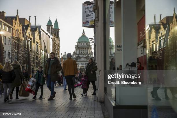 Shoppers walk along Donegall Place in Belfast, Northern Ireland, U.K., on Friday, Jan. 3, 2020. Nationalists who want to bring the island of Ireland...