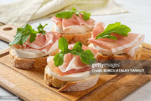 prosciutto mozzarella bruschetta - antipasto stock pictures, royalty-free photos & images