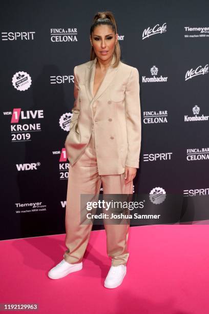 Senna Gammour arrives for the 1Live Krone radio award at Jahrhunderthalle on December 05, 2019 in Bochum, Germany.