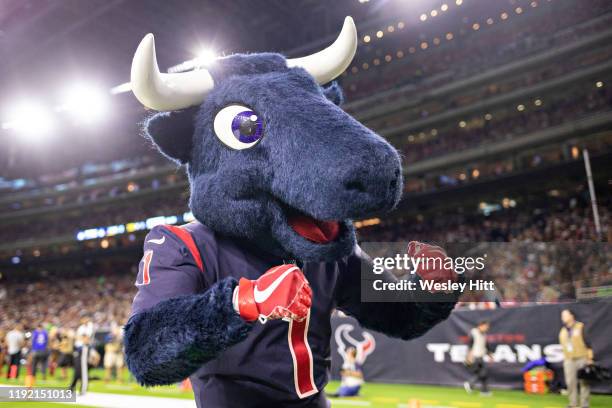 Mascot, Toro of the Houston Texans performs before a game against the New England Patriots at NRG Stadium on December 1, 2019 in Houston, Texas. The...