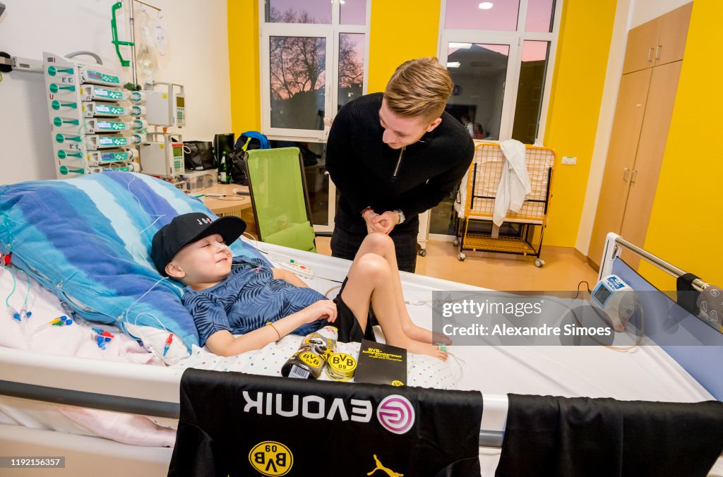 Borussia Dortmund Players Visit Children's Hospital Dortmund