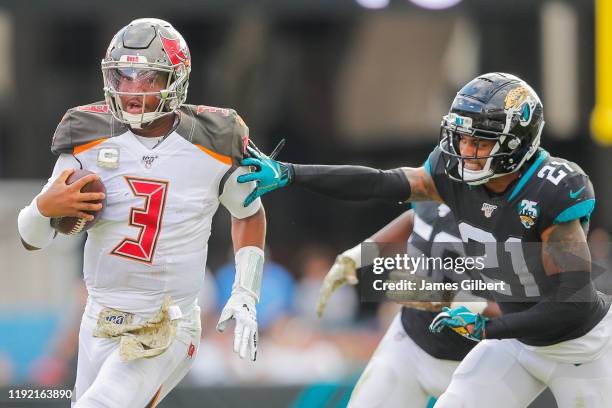 Jameis Winston of the Tampa Bay Buccaneers runs for yardage during the third quarter of a game against the Jacksonville Jaguars at TIAA Bank Field on...