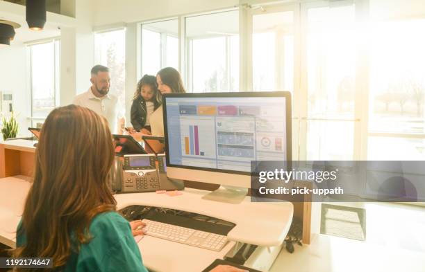 Receptionist Screen 11,791 Reception Screen Stock Photos, High-Res Pictures, and Images ...
