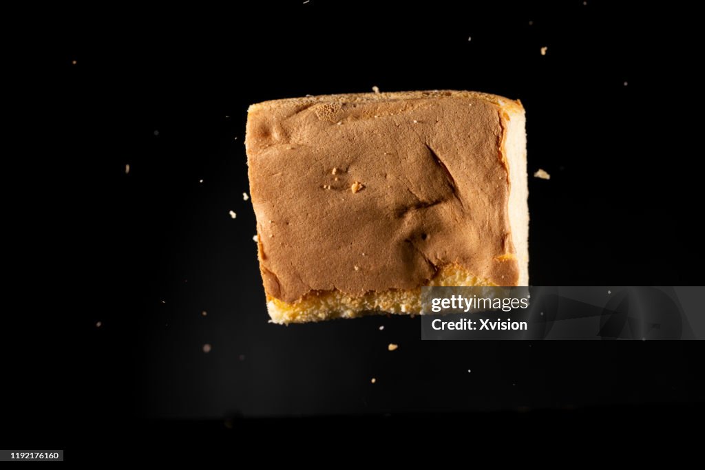 Cake flying in mid air captured with high speed sync.