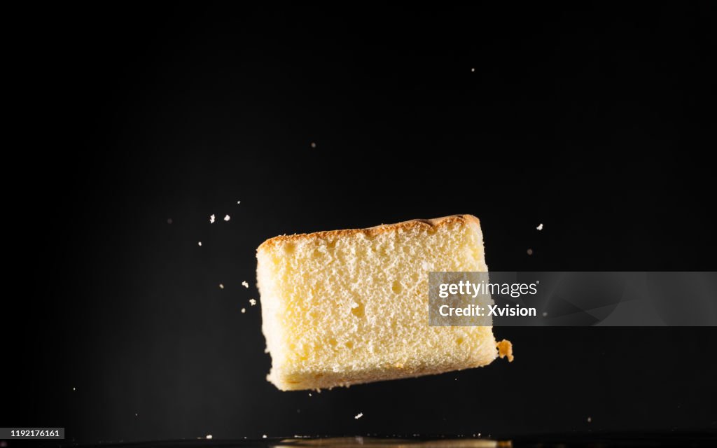 Cake flying in mid air captured with high speed sync.