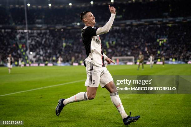 Juventus' Portuguese forward Cristiano Ronaldo celebrates after scoring his third goal during the Italian Serie A football match Juventus vs Cagliari...