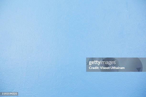 blue smooth concrete wall background. - unvollkommenheit stock-fotos und bilder