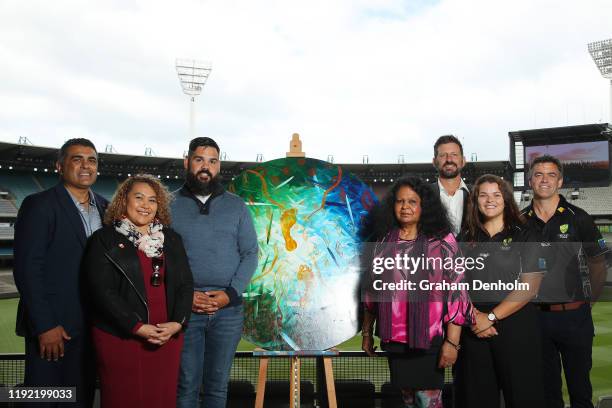 Justin Mohamed, Karen Mundine, Robert Young, Aunty Fiona Clarke, Michael Kasprowicz, Courtney Hagen and Adam Cassidy pose during the Cricket...