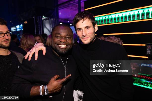 Gerald Asamoah and guest are seen during the 1Live Krone radio award at Jahrhunderthalle on December 05, 2019 in Bochum, Germany.