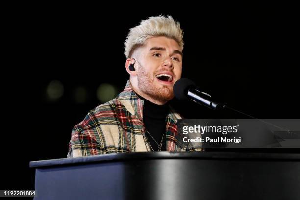 Colton Dixon performs at the 97th Annual National Christmas Tree Lighting Ceremony in President's Park on December 05, 2019 in Washington, DC.