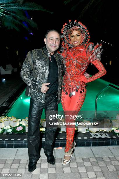Inlist Model poses with designer Jacob Meir of For The Stars Fashion House ...
