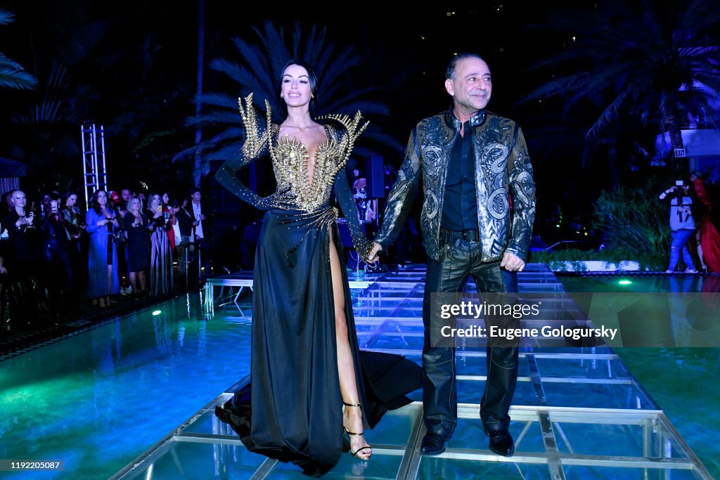 Inlist Model poses with designer Jacob Meir of For The Stars Fashion House ...