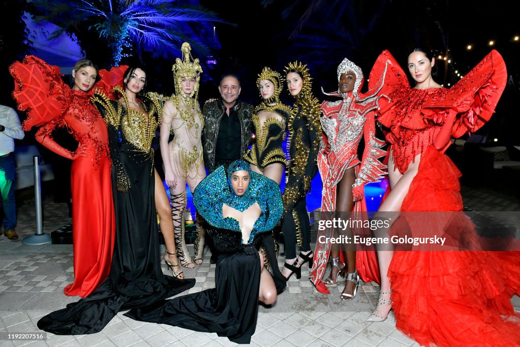 Inlist Models poses with designer Jacob Meir of For The Stars Fashion House ...