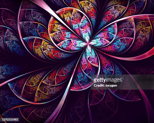 abstract flower fractal violet yellow glowing on black background - symmetry nature stock pictures, royalty-free photos & images