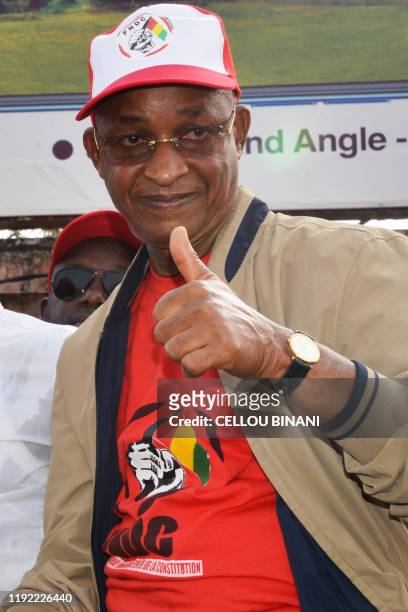 Guinea Opposition leader and former prime minister Cellou Dalein Diallo, wearing a cap and a tee-shirt of the National Front for the Defence of the...