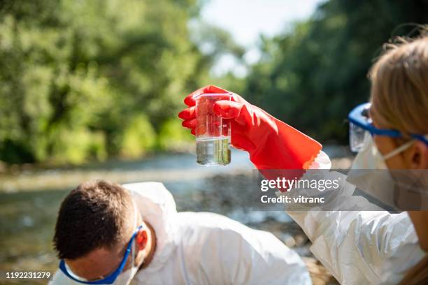 ecological water sampling - water sample stock pictures, royalty-free photos & images