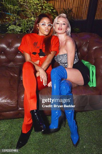 Larissa Muehleder and Caroline Vreeland attend BODEGA x DIESEL: The Unofficial Official Basel Gift Shop Party at La Otra on December 05, 2019 in...