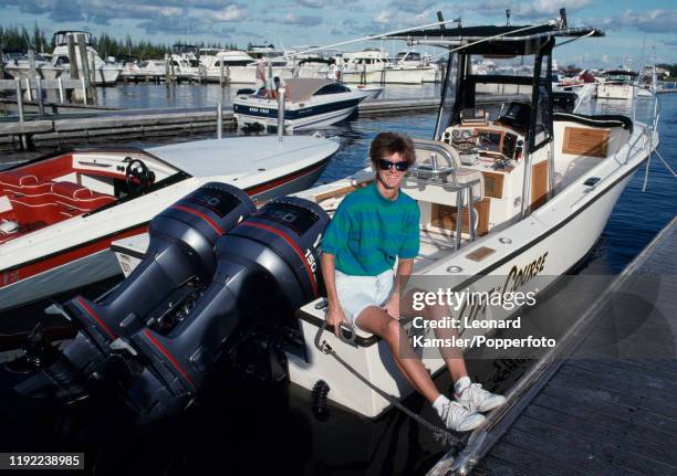 American golfer Beth Daniel at the marina on her twin-engine outboard motor cruiser "Off the Course", circa 1990.