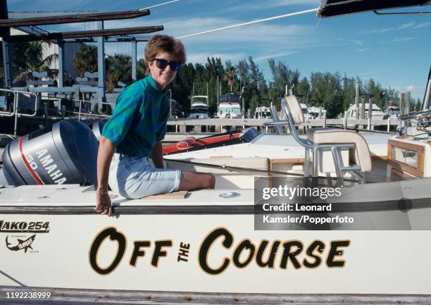 American golfer Beth Daniel at the marina on her twin-engine outboard motor cruiser "Off the Course", circa 1990.