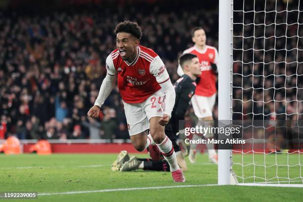 Reiss Nelson of Arsenal celebrates scoring the opening goal during the FA Cup Third Round match between Arsenal and Leeds United at Emirates Stadium...