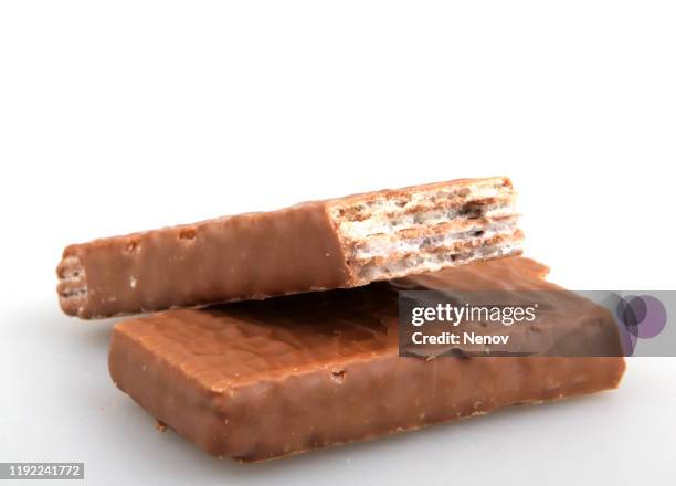 chocolate waffle isolated on white background - close up of chocolates for sale stock pictures, royalty-free photos & images