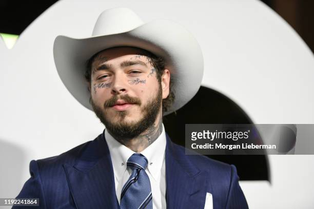 Post Malone arrives at the 2019 GQ Men Of The Year event at The West Hollywood Edition on December 05, 2019 in West Hollywood, California.