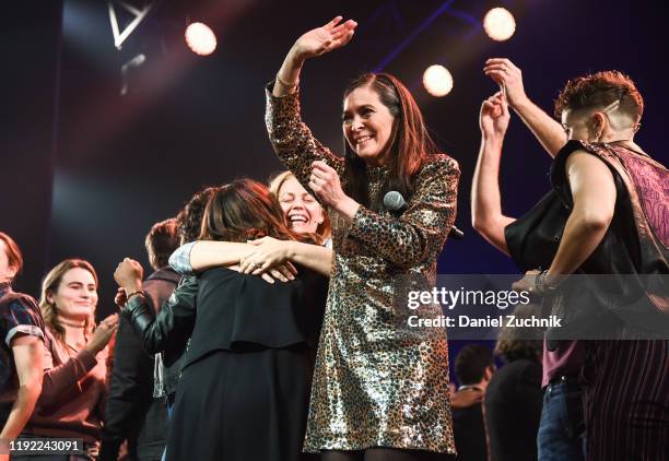 Diane Paulus and cast pose during the curtain call of the opening night of the broadway show "Jagged Little Pill" at Broadhurst Theatre on December...