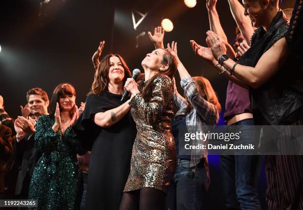 Alanis Morissette, Diane Paulus and cast pose during the curtain call of the opening night of the broadway show "Jagged Little Pill" at Broadhurst...