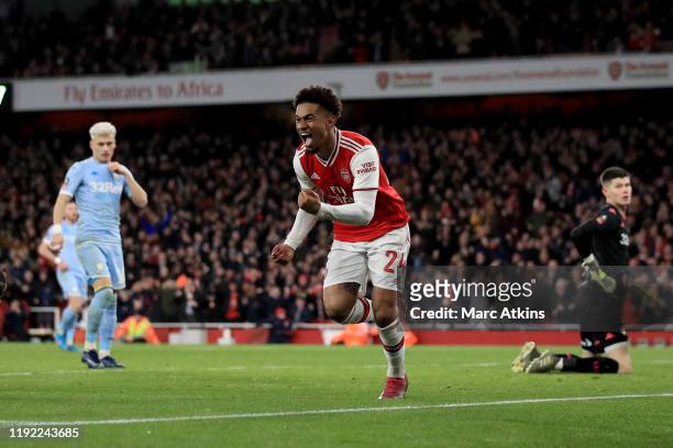 Reiss Nelson of Arsenal celebrates scoring the opening goal during the FA Cup Third Round match between Arsenal and Leeds United at Emirates Stadium...