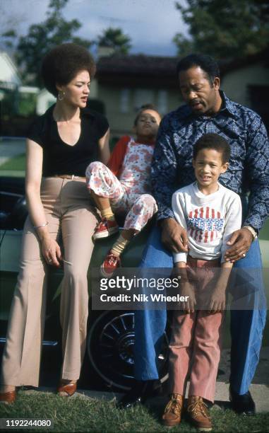 Former Black Panther Information Minister Eldridge Cleaver with his wife kathleen Cleaver and children Ahmad and Juji outside their home in Altadena...