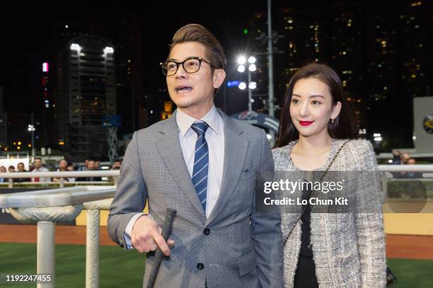 December 4 : Canto-pop superstar Aaron Kwok Fu-shing and his wife Moka Fang Yuan celebrate after Dancing Fighter winning the Race 9 Australia...