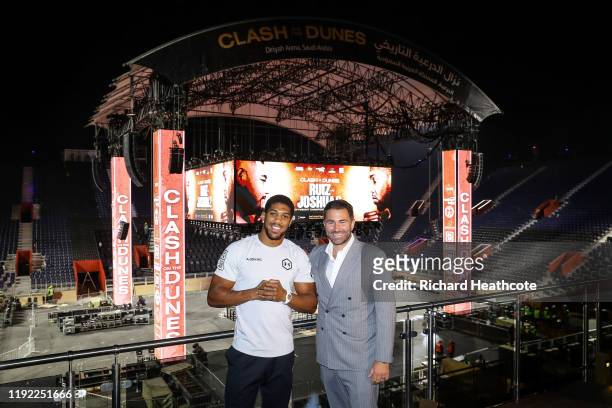 Anthony Joshua and Eddie Hearn pose for a photo inside the Diriyah Arena during the Clash On The Dunes Press Conference at the Diriyah Season...