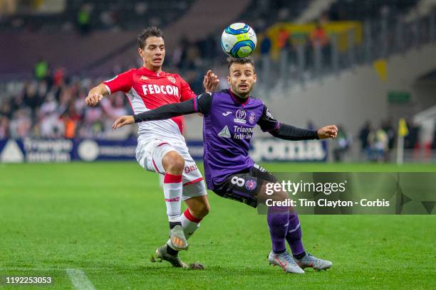 December 04: Wissam Ben Yedder of Monaco and Corentin Jean of Toulouse challenge for the ball during the Toulouse FC V AS Monaco, French Ligue 1...