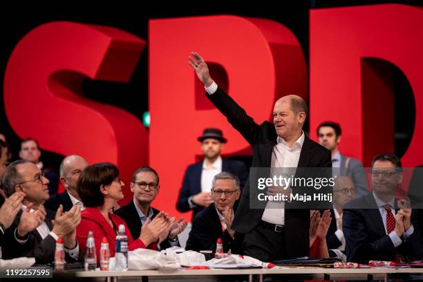 Olaf Scholz attends SPD federal party congress on December 6, 2019 in Berlin, Germany next to Norbert Walter-Borjans and Saskia Esken , who were...