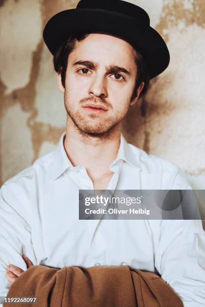 a young man with wearing with crossed arm - man arms crossed stock pictures, royalty-free photos & images