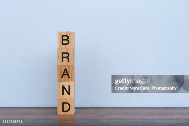 brand text on wood block - carol grow stock-fotos und bilder