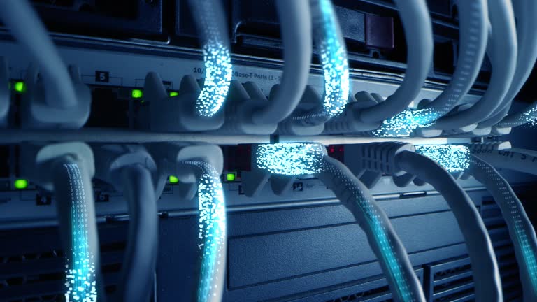 https://media.gettyimages.com/id/1192277833/video/ethernet-cables-connected-to-modem-with-digital-binary-code-streaming-information-and-data.jpg?b=1&s=640x640&k=20&c=7mPEBOQBP-PxdadcWKzI0RJSccSogaG1sUD_CEjG-Dw=