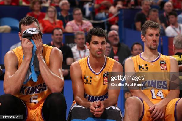 Andrew Bogut, Kevin Lisch and Daniel Kickert of the Kings sit on the bench during the round 10 NBL match between the Perth Wildcats and the Sydney...